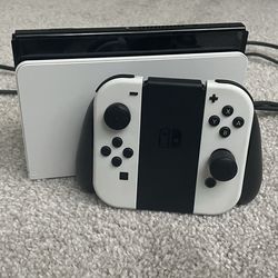 Nintendo Switch Oled with accessories