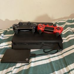 PlayStation 4 slim W/ Extra TB of Storage 
