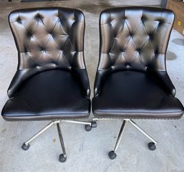 Faux leather chairs