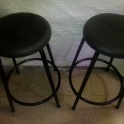 Two Plastic Top Metal Bar Stools.