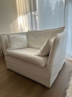 IKEA BACKSÄLEN 1.5-seat armchair in white.