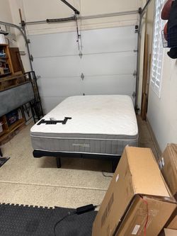 Ghost bed with adjustable frame base