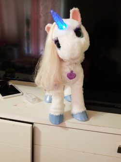 Furreal Friend Magical Unicorn Works Perfectly Fine . Couple Of Mark's On It.