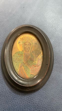 Antique Catholic icon of The Black Madonna of Częstochowa, a highly venerated icon featuring the Virgin Mary and Christ child
