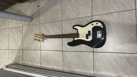 Black Electric Bass guitar plus amplifier