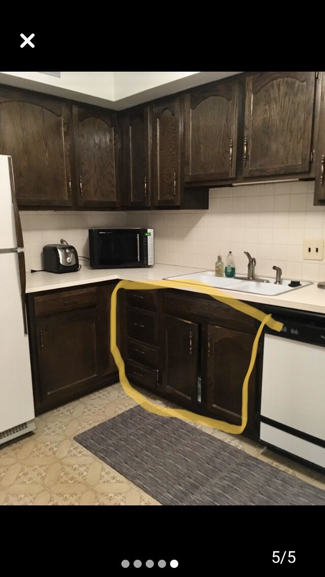 Kitchen cabinets, sink, faucet, counter