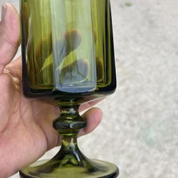  Vintage Green Glass Goblet  Elegant vintage green glass goblet, perfect for decor or use.  In great condition  Pick up location is around Greenhouse 