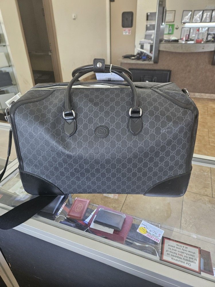 Gucci Interlock Luggage bag 
