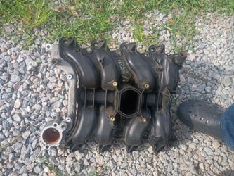 Dorman intake manifold with gaskets and thermostat