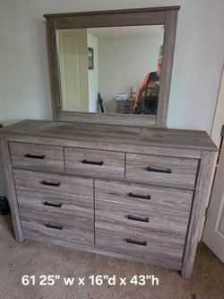 Ashley Furniture 7 drawer Grey dresser with mirror.