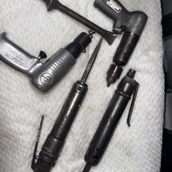 Pneumatic tool lot.  Zip gun,  scaler chisels, air drill