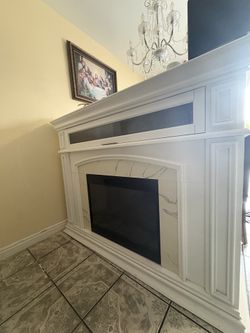 Electric fireplace and mantle