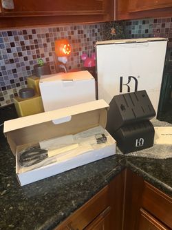 NIB 14 Piece Knifesaga Knife Set with Black Butcher Block.