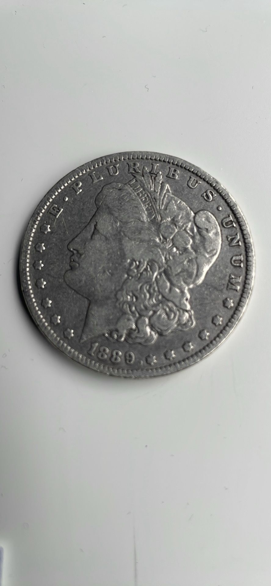 ollectible Coin – 1889 Morgan Silver Dollar (New Orleans Mint)