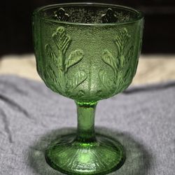 Vintage FTD 1975 embossed Green goblett.
