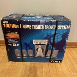 Coby 100 watt home theater speaker system. Brand new