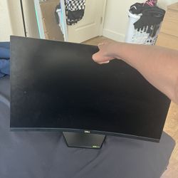 Ps5 with 2 controllers and headset and a gaming monitor 