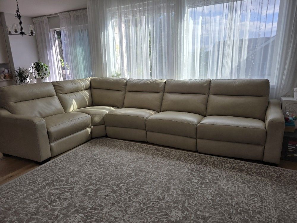 Gabrine 6-Pc. Leather sectional sofas with 5 power Headrests. We bought it at Macy's