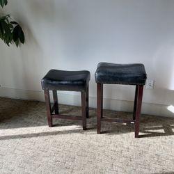 Two Leather Stools In Good Condition 