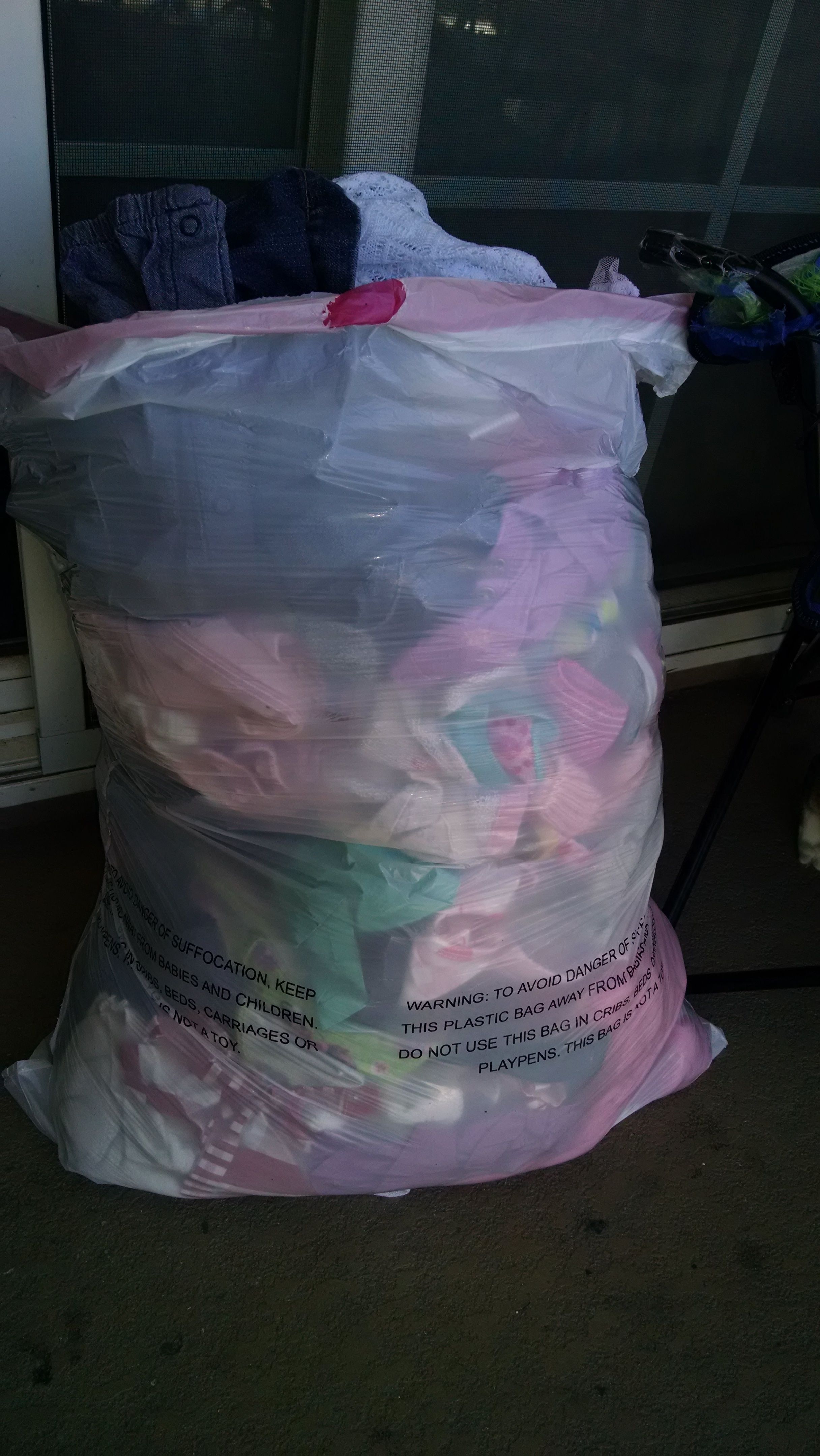 Garbage bag FULL of baby clothes