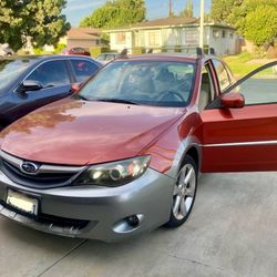 2010 SUBARU IMPREZA OUTBACK SPORT 