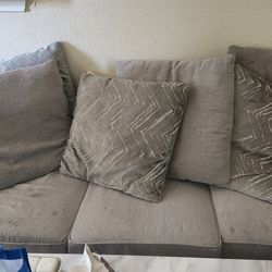 Love seat and ottoman.