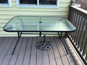 Rectangular Outdoor Table, 4 chairs With Cushions, Umbrella With Stand. 