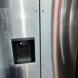 LG 36" 27cu.ft. Standard-Depth SIDE-BY-SIDE refrigerator in Stainless Steel with water & ice dispenser.