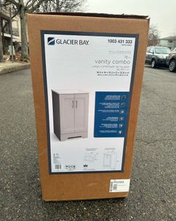 Glacier Bay Willowridge Bath Vanity in Dove Gray with Cultured Marble Vanity Top in White with White Sink available in BRAND NEW Condition.