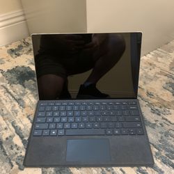 7th Gen i7 Touchscreen Surface with Office, Bluetooth, and Webcam