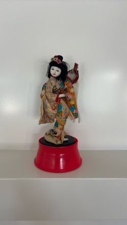 Japanese Geisha Doll on Red Base