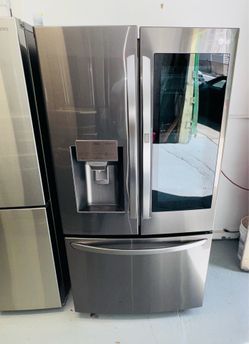 LG black stainless steel refrigerator (36" x 69" x 29"); includes a receipt for a 90-day warranty.
