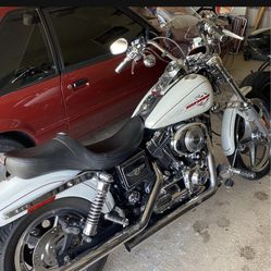 Bike is clean and has lots of chrome accessories, Vance & Hines pipes, new grips, new front tire, Corbin seat with passenger seat back rest. Bike has 