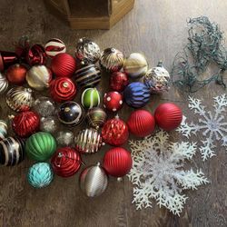 Large box of large ornaments, snowflakes & lights