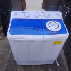 Compact washer with two tubs.