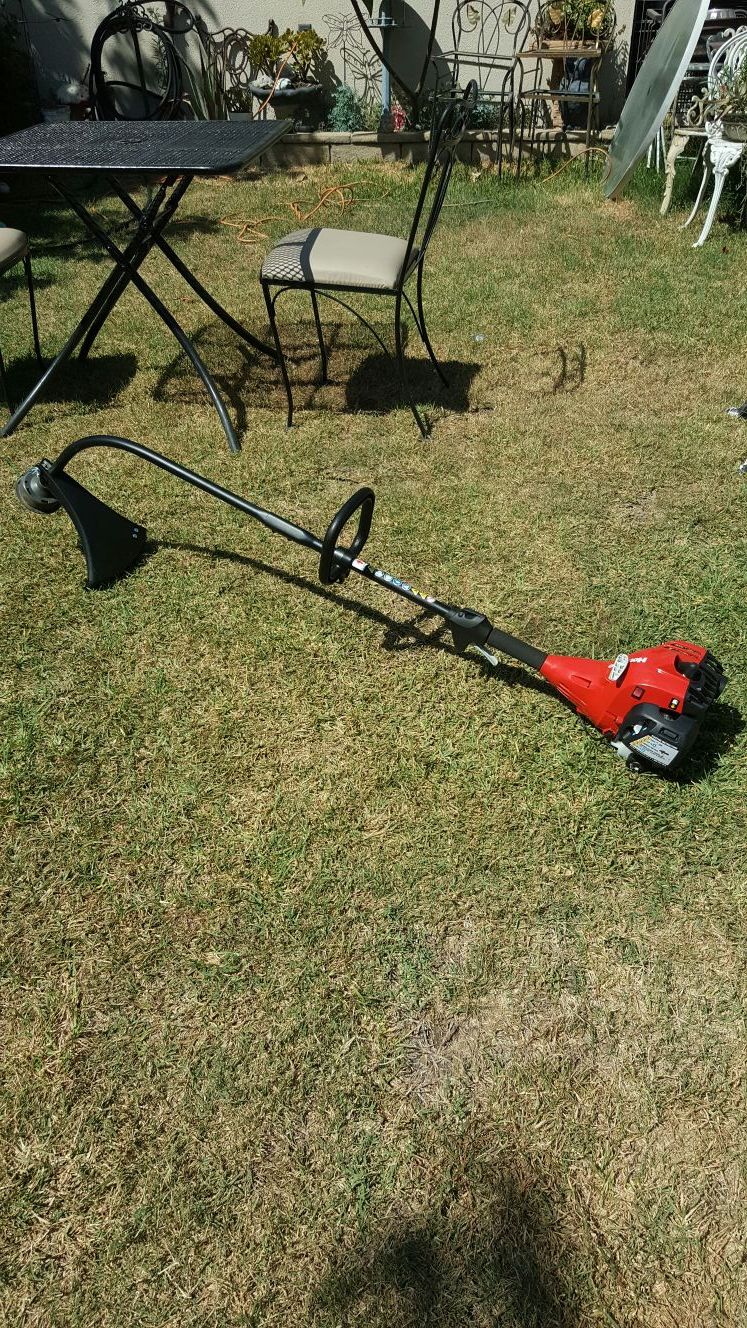 Brand new Homelite curved shaft gas weed eater for Sale in Upland CA OfferUp