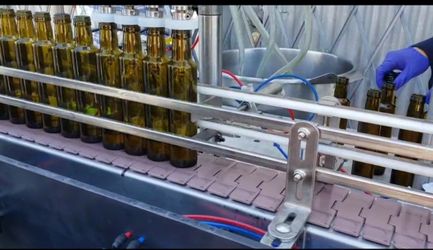 Bottle Filler. Packaging Equipment 