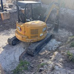 Bobcat And Excavator 