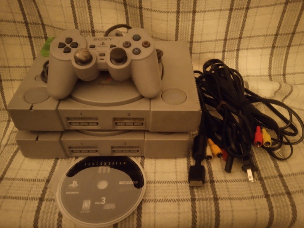 2 Original PlayStation Consoles/ 1 Controller/1 Memory Card And 1 Game