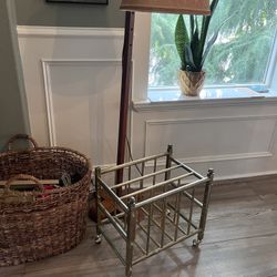 vintage brass book/magazine holder on wheels