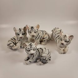 Set Of 4 Small Snow Tiger Resin Figurines 