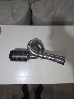 Motorcycle muffler and exhaust pipe