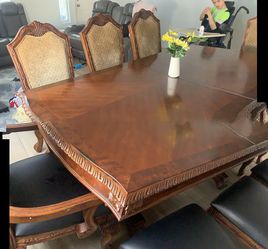 Solid Wood Table And 8 Chairs 94 Inches Long 44 Inches Wide 30 Inches Talll