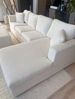 New cream sectionals with free ottoman