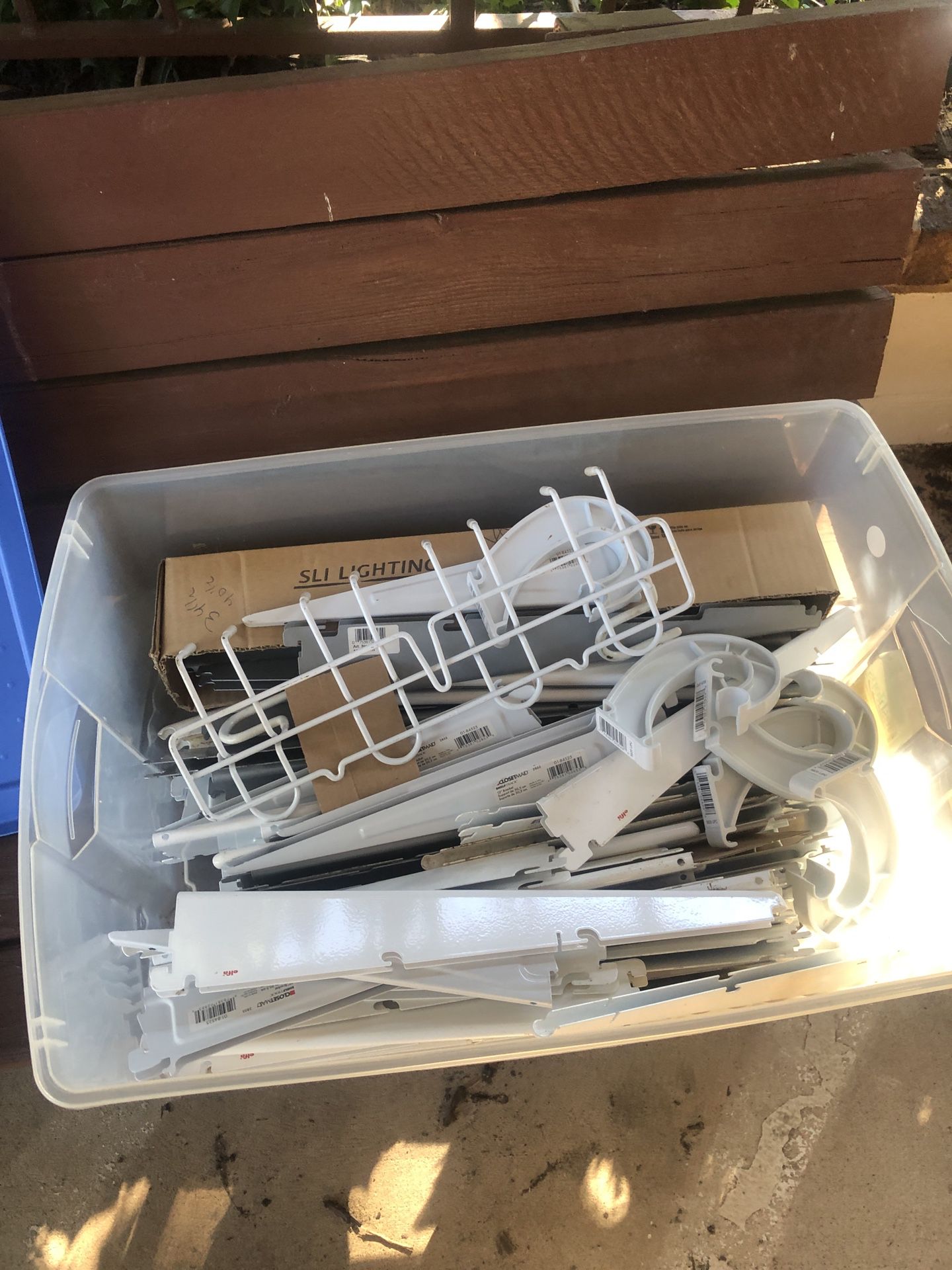 Box of closet shelving and hanger material