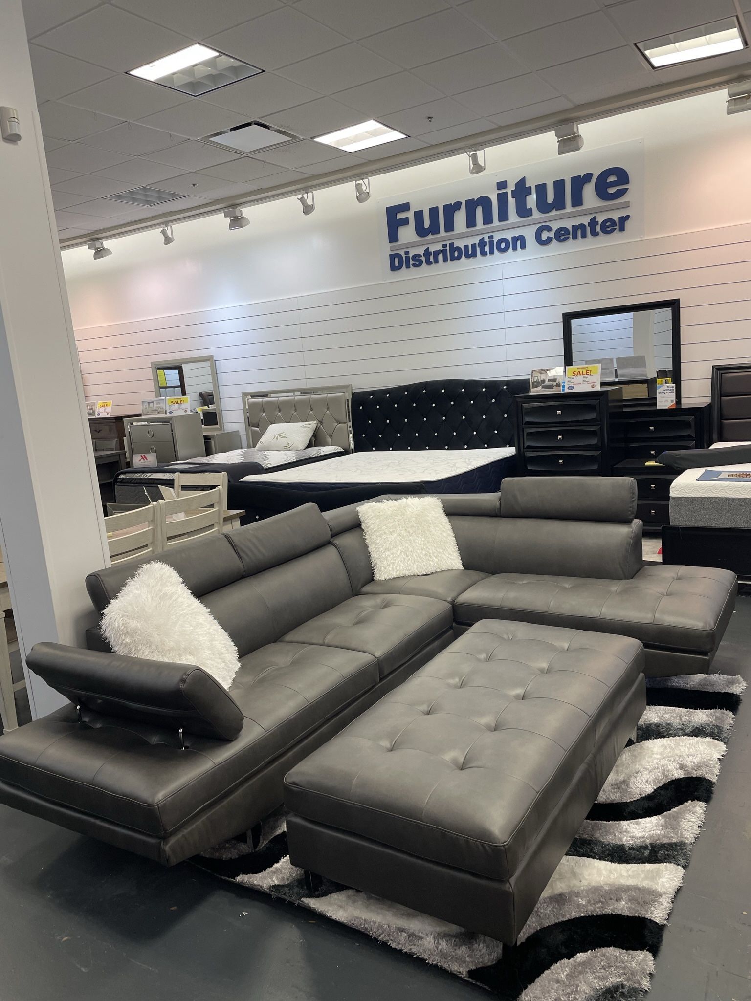 Going out of business sale. Ibiza gray sectional ottoman set now $899. Easy finance option. Same-day delivery.
