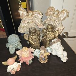 Angels Statues And Candles