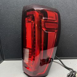 LED passenger tail light for a GMC sierra