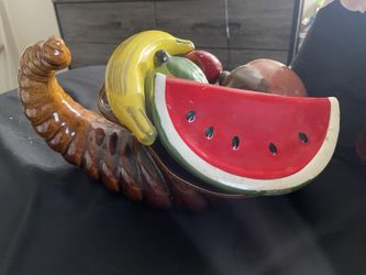 ceramic fruit in a loom