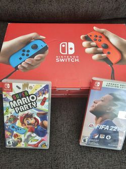 Nintendo Switch W/ Two Games